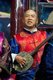 China: A man plays a sanxian, the Naxi (Nakhi) Folk Orchestra, Naxi Orchestra Hall, Lijiang Old Town, Yunnan Province